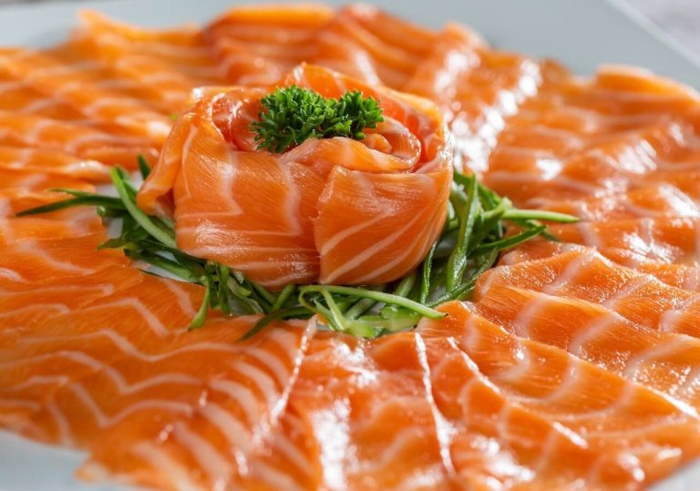 65415323d94a5c1227879d91_fresh-salmon-sashimi-on-white-plate